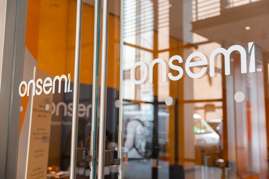 Close-up of the onsemi logo on the entrance doors.